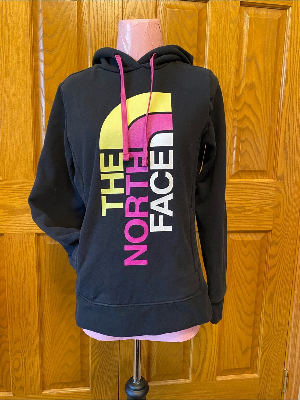 The North Face Black Hoodie with Yellow & Pink Logo